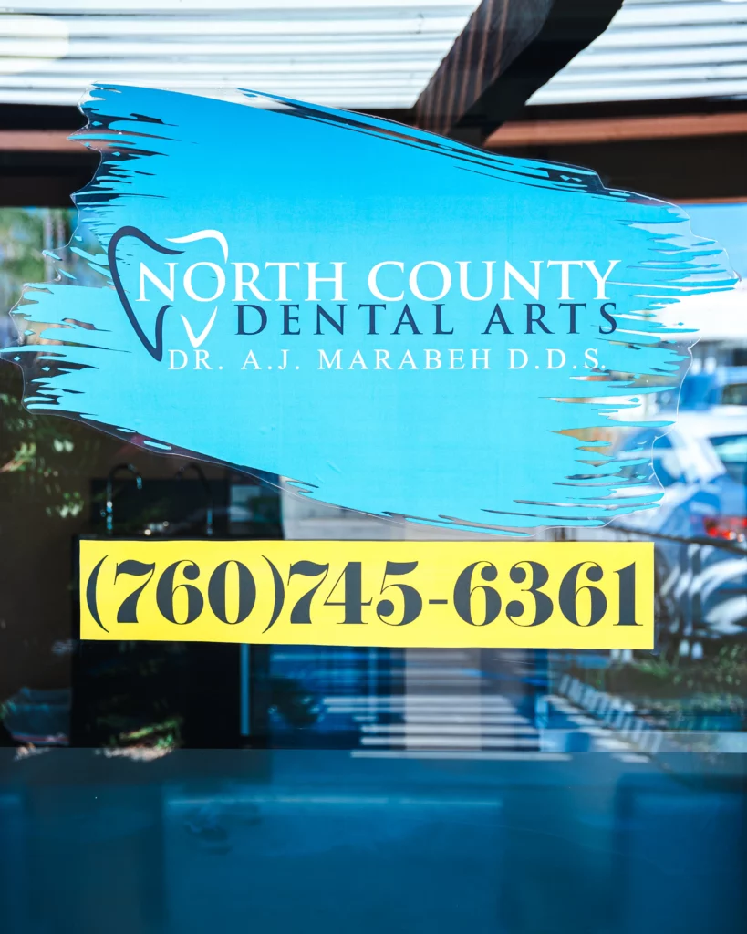 North County Dental Arts sign with contact number in Escondido, CA